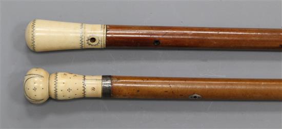 Two 19th century malacca canes, 39.5in. and 37.5in.